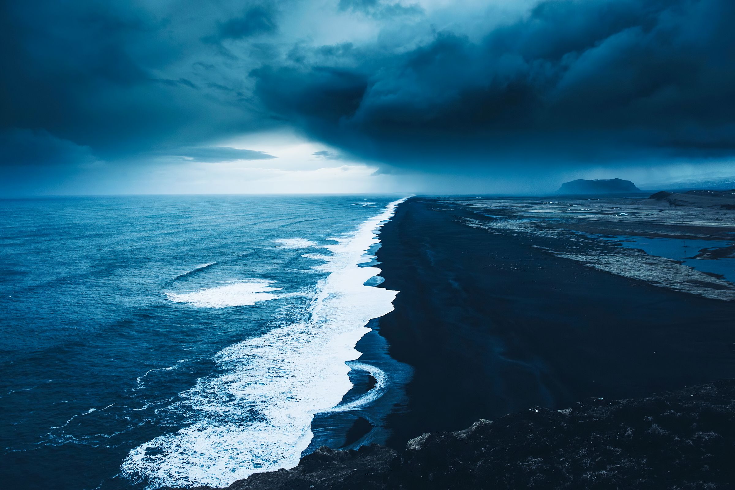 a dark, stormy beach